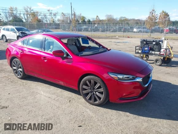 ✅ 2019 Mazda 6 Grand Touring • VIN: JM1GL1TY1K1509234 • Lot: 43559560. Listed on IAAI with 50,654 mi. Free auction sales archive from the USA and detailed vehicle history report at DreamBid. Image 1.