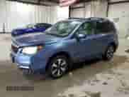 2017 Subaru Forester Limited with VIN JF2SJAJC5HH527843, listed as a Copart auction lot 82440135 with 64,197 mi miles and Salvage title. Bid and sale history available at DreamBid. Image 1.