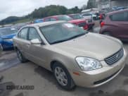 ✅ 2006 Kia Optima LX • VIN: KNAGE123965033553 • Lot: 43249124. Listed on IAAI with 128,780 mi. Free auction sales archive from the USA and detailed vehicle history report at DreamBid. Image 1.