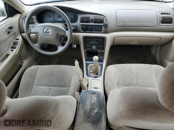 ✅ 2001 Mazda 626 LX • VIN: 1YVGF22C715202574 • Лот: 54132915. Опубликован ранее на Copart с пробегом 237 041 миль. Бесплатный доступ к архиву аукционных продаж из США и подробный отчёт об истории автомобиля на DreamBid. Изображение 8.