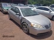 ✅ 2006 Pontiac G6 6-Cyl • VIN: 1G2ZG558564271124 • Lot: 42743040. Wystawiony na IAAI z przebiegiem 165 294 mil. Bezpłatny archiwum sprzedaży aukcyjnych z USA i szczegółowy raport historii pojazdu na DreamBid. Zdjęcie 1.