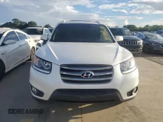 ✅ 2012 Hyundai Santa Fe Limited • VIN: 5XYZK4AG0CG104670 • Lot: 74339274. Listed on Copart with 69,102 mi. Free auction sales archive from the USA and detailed vehicle history report at DreamBid. Image 5.