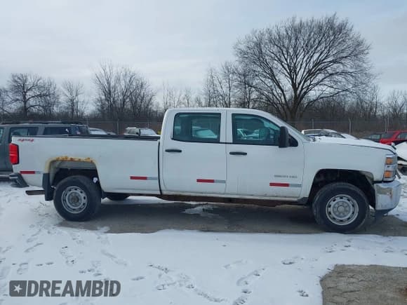 ✅ 2015 Chevrolet Silverado 2500HD Work Truck • VIN: 1GC1KUEG6FF141981 • Лот: 41480387. Опубликован ранее на IAAI с пробегом 267 557 миль. Бесплатный доступ к архиву аукционных продаж из США и подробный отчёт об истории автомобиля на DreamBid. Изображение 13.