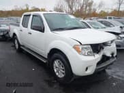 ✅ 2016 Nissan Frontier S • VIN: 1N6AD0EV5GN742191 • Lot: 43554422. Listed on IAAI with 58,859 mi. Free auction sales archive from the USA and detailed vehicle history report at DreamBid. Image 1.