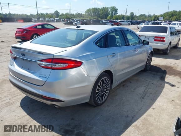 ✅ 2017 Ford Fusion Hybrid Titanium • VIN: 3FA6P0RU4HR387052 • Лот: 43191238. Опубликован ранее на IAAI с пробегом 204 571 миль. Бесплатный доступ к архиву аукционных продаж из США и подробный отчёт об истории автомобиля на DreamBid. Изображение 4.