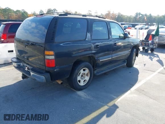 ✅ 2004 Chevrolet Tahoe LT • VIN: 1GNEC13Z64J117571 • Lot: 43629588. Wystawiony na IAAI z przebiegiem 335 042 mil. Bezpłatny archiwum sprzedaży aukcyjnych z USA i szczegółowy raport historii pojazdu na DreamBid. Zdjęcie 4.