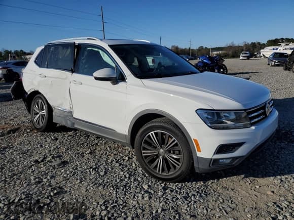 ✅ 2018 Volkswagen Tiguan SEL • VIN: 3VV3B7AX3JM047891 • Лот: 41615545. Опубликован ранее на Copart с пробегом 63 995 миль. Бесплатный доступ к архиву аукционных продаж из США и подробный отчёт об истории автомобиля на DreamBid. Изображение 4.