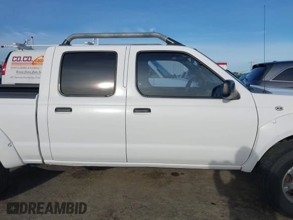 ✅ 2004 Nissan Frontier XE • VIN: 1N6ED29Y74C431516 • Lot: 41838579. Wystawiony na IAAI z przebiegiem 179 135 mil. Bezpłatny archiwum sprzedaży aukcyjnych z USA i szczegółowy raport historii pojazdu na DreamBid. Zdjęcie 13.