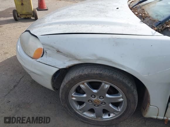 ✅ 2001 Chrysler Sebring LXi • VIN: 4C3AG52H61E190300 • Lot: 41551135. Listed on IAAI with 123,715 mi. Free auction sales archive from the USA and detailed vehicle history report at DreamBid. Image 6.