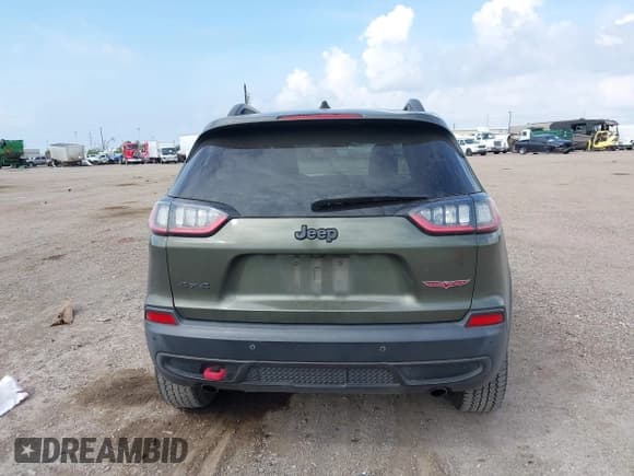 ✅ 2019 Jeep Cherokee Trailhawk • VIN: 1C4PJMBX7KD200334 • Лот: 43383144. Опубликован ранее на IAAI с пробегом 245 711 миль. Бесплатный доступ к архиву аукционных продаж из США и подробный отчёт об истории автомобиля на DreamBid. Изображение 17.