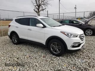 ✅ 2018 Hyundai Santa Fe 2.4L • VIN: 5NMZUDLB4JH098211 • Лот: 69748312. Опубликован ранее на Copart с пробегом 54 445 миль. Бесплатный доступ к архиву аукционных продаж из США и подробный отчёт об истории автомобиля на DreamBid. Изображение 4.