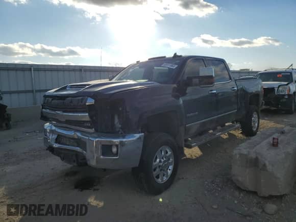 2017 Chevrolet Silverado 3500HD LTZ with VIN 1GC4K0EY7HF213904, listed as a Copart auction lot 83911964 with 121,143 mi miles and Salvage title. Bid and sale history available at DreamBid. Image 1.