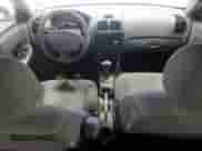 2005 Hyundai Accent GLS z VIN KMHCG45C15U602419, wystawiony jako Copart lot #47759675 z przebiegiem 58 133 mil mil oraz Szkoda całkowita • Salvage title. Historia ofert i sprzedaży dostępna na DreamBid. Obrazek 8.