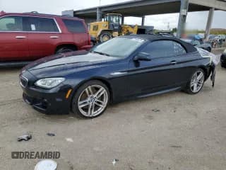 ✅ 2015 BMW 6 Series 650i xDrive • VIN: WBAYP1C55FD217098 • Lot: 77166474. Wystawiony na Copart z przebiegiem 30 608 mil. Bezpłatny archiwum sprzedaży aukcyjnych z USA i szczegółowy raport historii pojazdu na DreamBid. Zdjęcie 1.