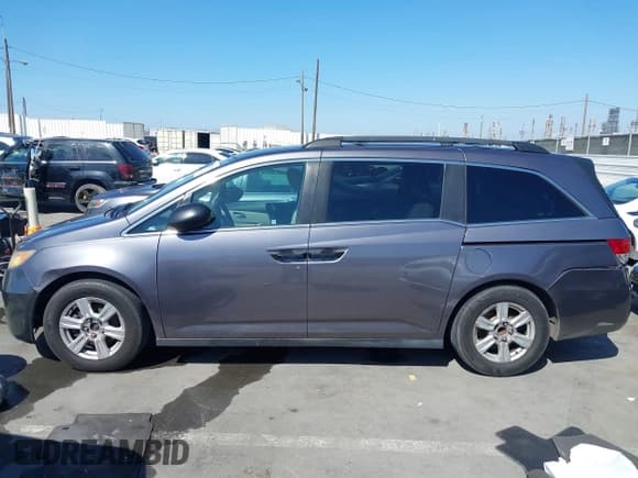 ✅ 2015 Honda Odyssey LX • VIN: 5FNRL5H28FB078408 • Lot: 43405203. Listed on IAAI with 170,009 mi. Free auction sales archive from the USA and detailed vehicle history report at DreamBid. Image 14.