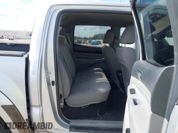 ✅ 2013 Toyota Tacoma PreRunner • VIN: 5TFJU4GN0DX044952 • Lot: 43655844. Listed on IAAI with 91,202 mi. Free auction sales archive from the USA and detailed vehicle history report at DreamBid. Image 8.