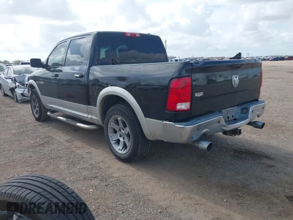 ✅ 2009 Dodge 1500 Laramie • VIN: 1D3HB13T29S778382 • Lot: 42456475. Wystawiony na IAAI z przebiegiem 229 669 mil. Bezpłatny archiwum sprzedaży aukcyjnych z USA i szczegółowy raport historii pojazdu na DreamBid. Zdjęcie 3.