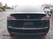 ✅ 2025 Tesla Model Y Long Range • VIN: 7SAYGDED3SF236893 • Лот: 43698211. Опубликован ранее на IAAI с пробегом 2 586 миль. Бесплатный доступ к архиву аукционных продаж из США и подробный отчёт об истории автомобиля на DreamBid. Изображение 16.
