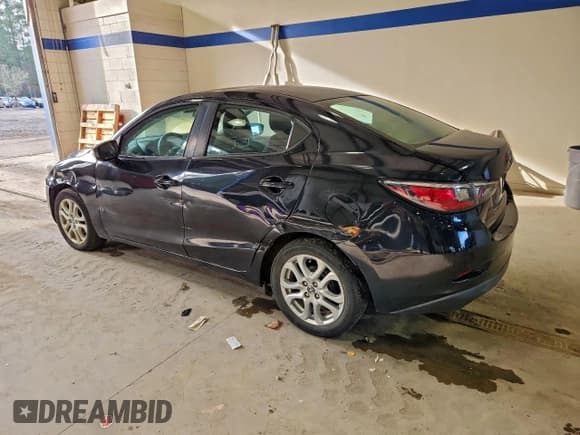 ✅ 2016 Scion iA • VIN: 3MYDLBZV7GY130992 • Lot: 95266115. Wystawiony na Copart z przebiegiem 131 414 mil. Bezpłatny archiwum sprzedaży aukcyjnych z USA i szczegółowy raport historii pojazdu na DreamBid. Zdjęcie 2.