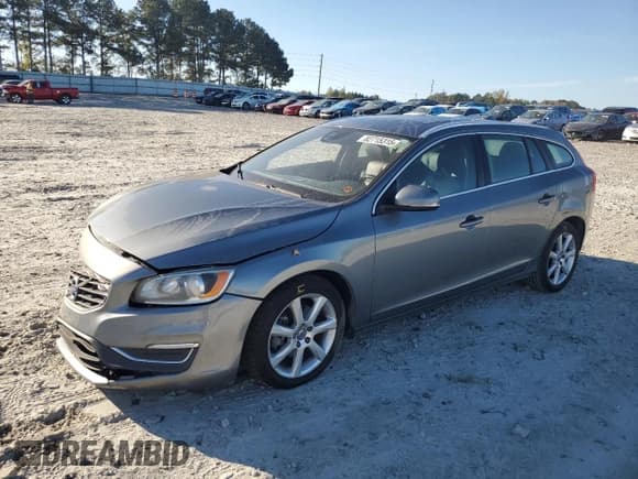 ✅ 2017 Volvo V60 Premier • VIN: YV140MEK2H1337627 • Lot: 82715315. Listed on Copart with 104,350 mi. Free auction sales archive from the USA and detailed vehicle history report at DreamBid. Image 1.