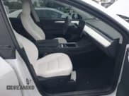 ✅ 2023 Tesla Model Y Long Range • VIN: 7SAYGDEE3PA055497 • Lot: 42396529. Listed on IAAI with 18,230 mi. Free auction sales archive from the USA and detailed vehicle history report at DreamBid. Image 5.