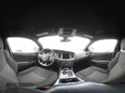 ✅ 2023 Dodge Charger SXT • VIN: 2C3CDXBG5PH579520 • Lot: 43245472. Listed on IAAI with 59,873 mi. Free auction sales archive from the USA and detailed vehicle history report at DreamBid. Image 18.