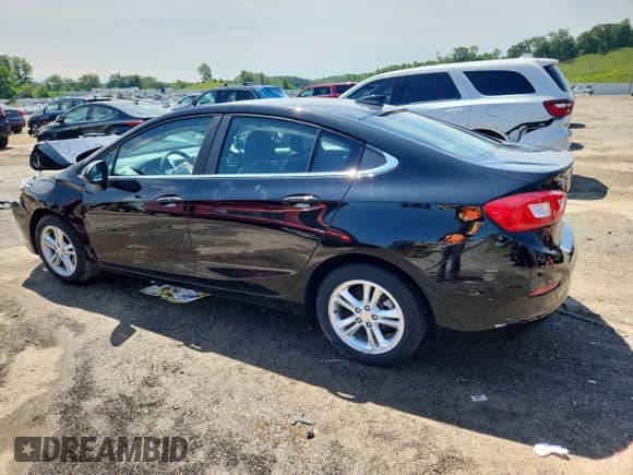 2017 Chevrolet Cruze LT with VIN 1G1BH5SE7H7251133, listed as a Copart auction lot 61690515 with 95,807 mi miles and Non repairable. Bid and sale history available at DreamBid. Image 2.