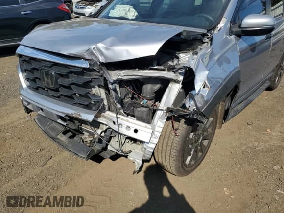 ✅ 2022 Honda Passport EX-L • VIN: 5FNYF8H50NB031970 • Lot: 80192355. Listed on Copart with 54,898 mi. Free auction sales archive from the USA and detailed vehicle history report at DreamBid. Image 13.