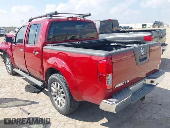 ✅ 2009 Nissan Frontier SE • VIN: 1N6AD07U49C414554 • Lot: 43535966. Listed on IAAI with 166,133 mi. Free auction sales archive from the USA and detailed vehicle history report at DreamBid. Image 3.