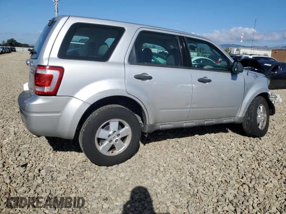✅ 2009 Ford Escape XLS • VIN: 1FMCU02749KB40030 • Lot: 91809815. Listed on Copart with 161,697 mi. Free auction sales archive from the USA and detailed vehicle history report at DreamBid. Image 3.