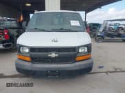 ✅ 2015 Chevrolet Express Cargo • VIN: 1GCWGGCF0F1184129 • Lot: 42705530. Listed on IAAI with 185,687 mi. Free auction sales archive from the USA and detailed vehicle history report at DreamBid. Image 12.