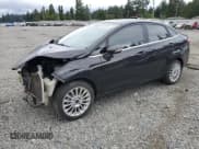 ✅ 2015 Ford Fiesta Titanium • VIN: 3FADP4CJ4FM198201 • Lot: 61480925. Wystawiony na Copart z przebiegiem 143 890 mil. Bezpłatny archiwum sprzedaży aukcyjnych z USA i szczegółowy raport historii pojazdu na DreamBid. Zdjęcie 1.