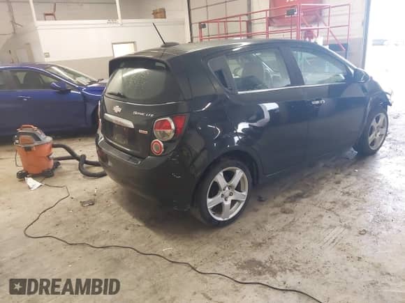 2016 Chevrolet Sonic LTZ с VIN 1G1JE6SB3G4150803, выставлен на аукционе IAAI как лот 42007951 с пробегом 124 811 миль миль и . История ставок и продаж доступна на DreamBid. Изображение 4.