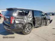 ✅ 2021 Chevrolet Suburban LT • VIN: 1GNSCCKD4MR174227 • Lot: 82164525. Listed on Copart with 99,717 mi. Free auction sales archive from the USA and detailed vehicle history report at DreamBid. Image 3.