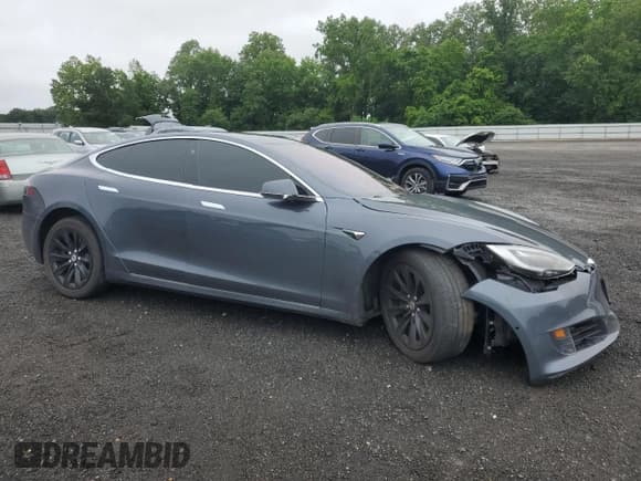 ✅ 2017 Tesla Model S 60 • VIN: 5YJSA1E13HF199345 • Lot: 61021655. Wystawiony na Copart z przebiegiem Nie podano. Bezpłatny archiwum sprzedaży aukcyjnych z USA i szczegółowy raport historii pojazdu na DreamBid. Zdjęcie 4.