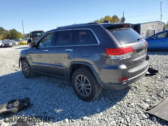 2017 Jeep Grand Cherokee Limited with VIN 1C4RJEBG0HC944015, listed as a Copart auction lot 82507335 with 141,846 mi miles and Salvage title. Bid and sale history available at DreamBid. Image 2.