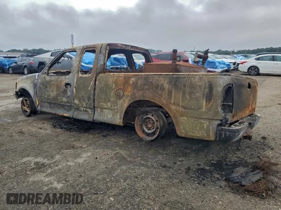 ✅ 2003 Ford F-150 XL • VIN: 2FTRX18W43CA75041 • Lot: 95665335. Listed on Copart with Not provided. Free auction sales archive from the USA and detailed vehicle history report at DreamBid. Image 2.