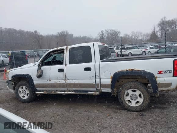 2004 Chevrolet Silverado 1500 Z71 with VIN 2GCEK13T741427729, listed as a IAAI auction lot 41238310 with 151,978 mi miles and . Bid and sale history available at DreamBid. Image 14.