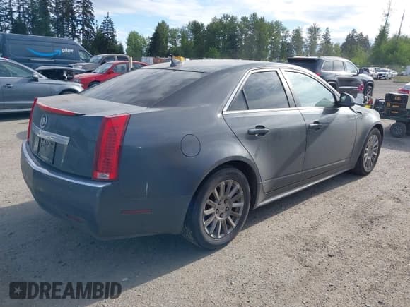 ✅ 2012 Cadillac CTS • VIN: 1G6DC5E55C0150770 • Lot: 42201626. Listed on IAAI with 238,753 mi. Free auction sales archive from the USA and detailed vehicle history report at DreamBid. Image 4.