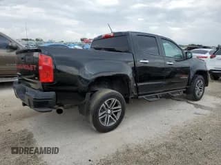 ✅ 2021 Chevrolet Colorado 2WD Work Truck • VIN: 1GCGSBEN1M1146030 • Лот: 64027614. Опубликован ранее на Copart с пробегом 65 223 миль. Бесплатный доступ к архиву аукционных продаж из США и подробный отчёт об истории автомобиля на DreamBid. Изображение 3.