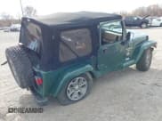 ✅ 2001 Jeep Wrangler Sahara • VIN: 1J4FA59S61P341186 • Lot: 43694775. Listed on IAAI with Not provided. Free auction sales archive from the USA and detailed vehicle history report at DreamBid. Image 4.