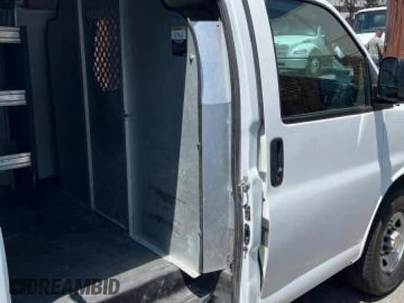 ✅ 2021 Chevrolet Express Cargo • VIN: 1GCWGAFP2M1207828 • Lot: 70939385. Listed on Copart with 81,278 mi. Free auction sales archive from the USA and detailed vehicle history report at DreamBid. Image 12.