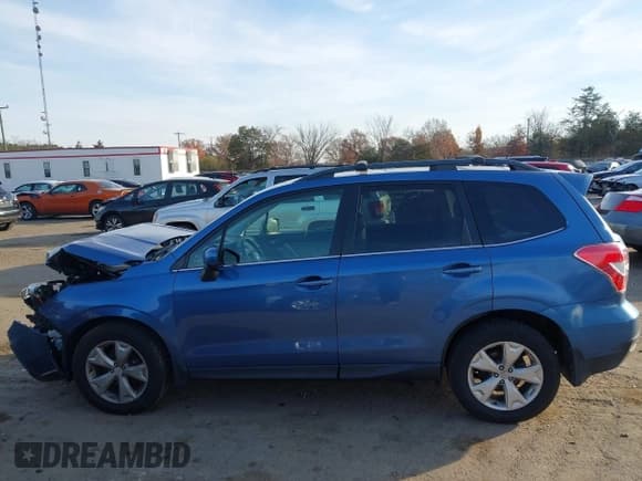 ✅ 2015 Subaru Forester Limited • VIN: JF2SJAHC7FH461461 • Lot: 43618829. Listed on IAAI with 86,340 mi. Free auction sales archive from the USA and detailed vehicle history report at DreamBid. Image 14.