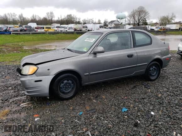 2003 Hyundai Accent GL with VIN KMHCG35C33U261046, listed as a Copart auction lot 48846125 with 108,742 mi miles and Salvage title. Bid and sale history available at DreamBid. Image 1.