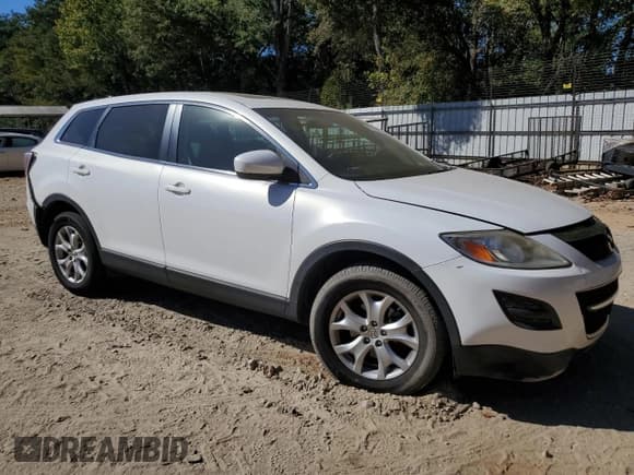 ✅ 2012 Mazda CX-9 Touring • VIN: JM3TB3CA1C0338029 • Lot: 82382125. Listed on Copart with 128,989 mi. Free auction sales archive from the USA and detailed vehicle history report at DreamBid. Image 4.