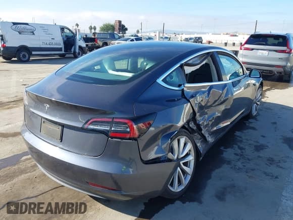 ✅ 2020 Tesla Model 3 Standard Range Plus • VIN: 5YJ3E1EA9LF662591 • Lot: 43642335. Listed on IAAI with 25,888 mi. Free auction sales archive from the USA and detailed vehicle history report at DreamBid. Image 4.