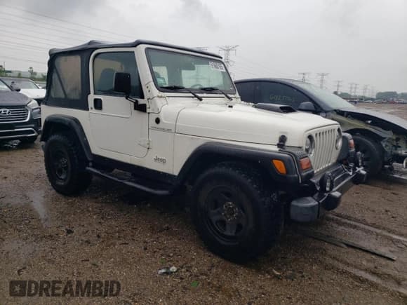 ✅ 1997 Jeep Wrangler SE • VIN: 1J4FY29P2VP414498 • Lot: 61660165. Wystawiony na Copart z przebiegiem 97 106 mil. Bezpłatny archiwum sprzedaży aukcyjnych z USA i szczegółowy raport historii pojazdu na DreamBid. Zdjęcie 4.