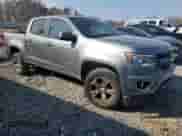 2020 Chevrolet Colorado 2WD Z71 with VIN 1GCGSDEN1L1170631, listed as a Copart auction lot 44032435 with 102,766 mi miles and Salvage title. Bid and sale history available at DreamBid. Image 4.