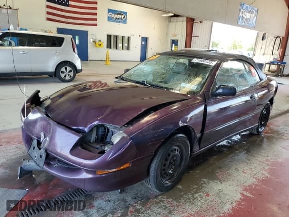 ✅ 1997 Pontiac Sunfire • VIN: 4G2JB32T9VB206715 • Lot: 71900135. Listed on Copart with 111,059 mi. Free auction sales archive from the USA and detailed vehicle history report at DreamBid. Image 1.