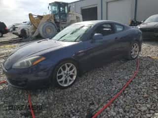 2008 Hyundai Tiburon GT z VIN KMHHN66F08U288041, wystawiony jako Copart lot #48870495 z przebiegiem 212 039 mil mil oraz Czysty tytuł • Clean title. Historia ofert i sprzedaży dostępna na DreamBid. Obrazek 1.